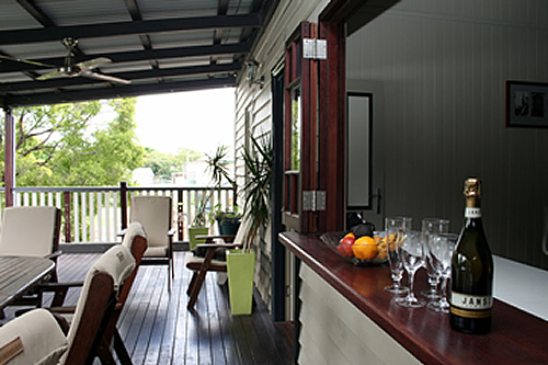 This patio addition has a bar window to make the most of outdoor living in Nundah.
